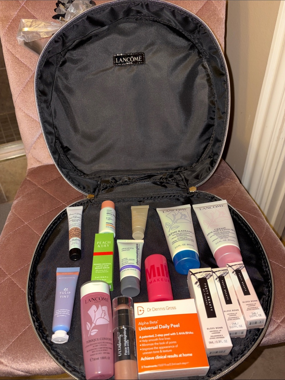 Ulta Beauty Black Round Travel Cosmetic Case with Assorted Skincare